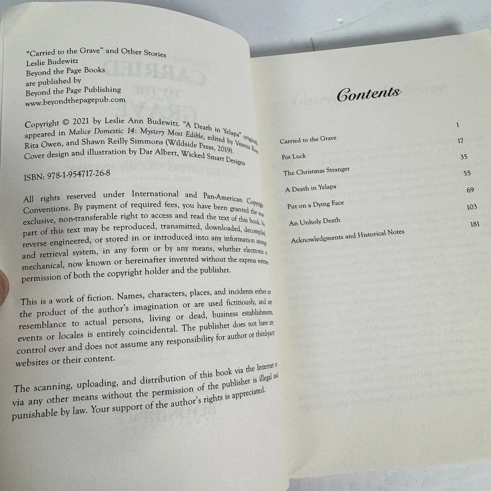 Carried to the Grave & Other Stories Leslie Budewitz 2021‎ Food Lovers Mystery